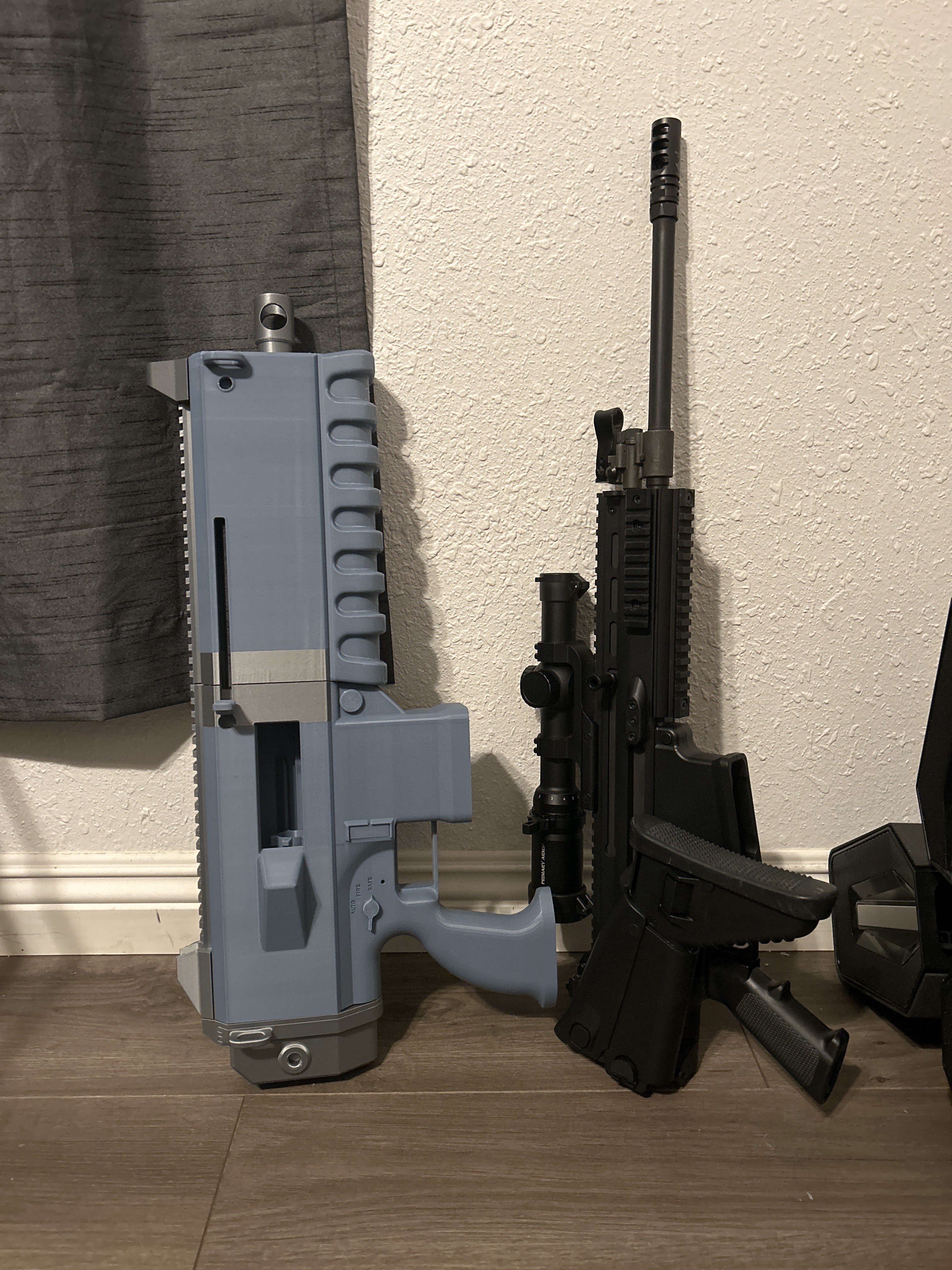 Bolter prototype next to scare with folded stock.jpg