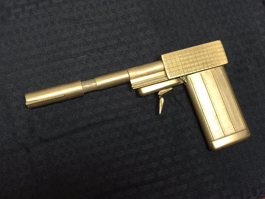 Brass Golden Gun.png