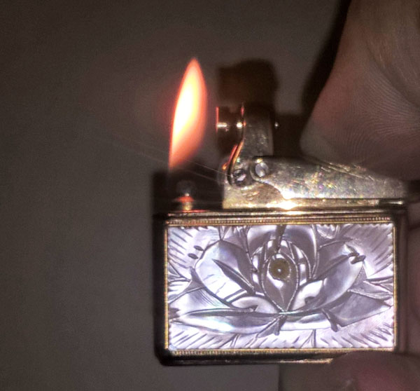 Colibri Mother of Pearl Wick Lighter 01s Lit.jpg