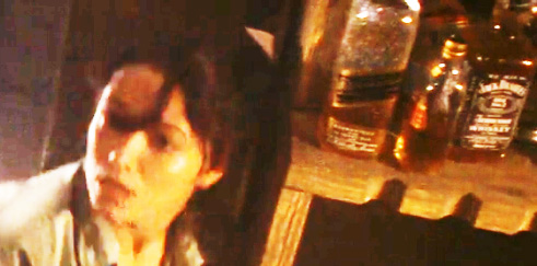Jack Bottle Behind Bar.jpg