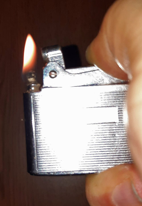 Ronson Adonis Newer Version Dark Passage Lighter 03 Lit.jpg