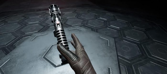 -vaderimmortal-lightsaberhandle-reach-700x311_orig.jpg