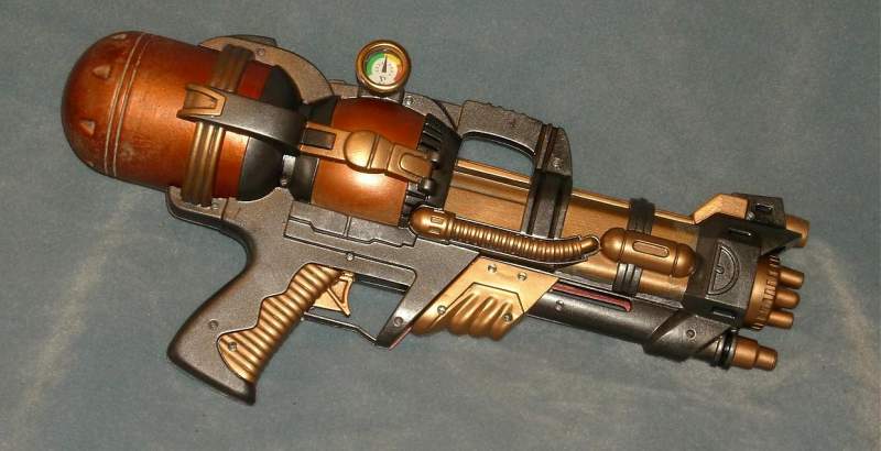 A steampunk raygun prop made from a cheap water pistol. (sold)