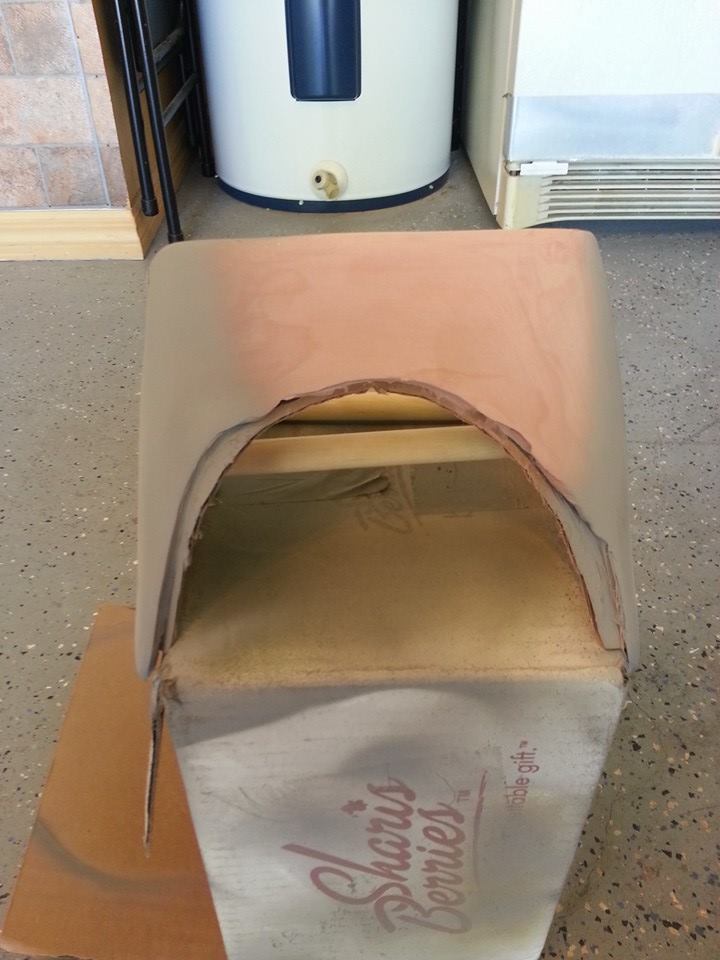 a week later started adding the usual bondo not much since dont want overlap it this time i imprevise used a wood stick to support its shape which was