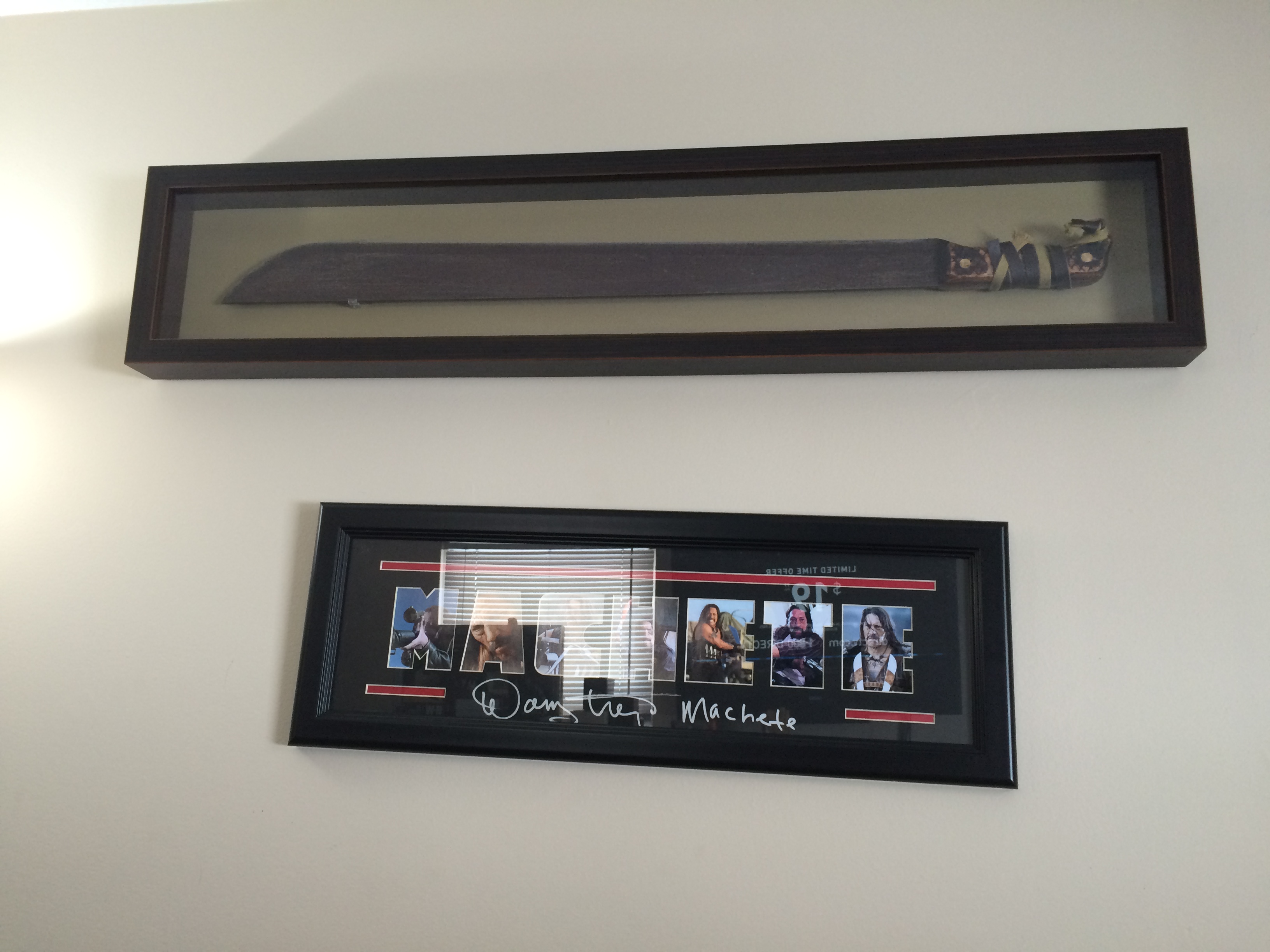 Above is a nicely framed commercially produced replica of a Machete from the remake of Friday the 13th.  Its one of the better replicas I have seen fo