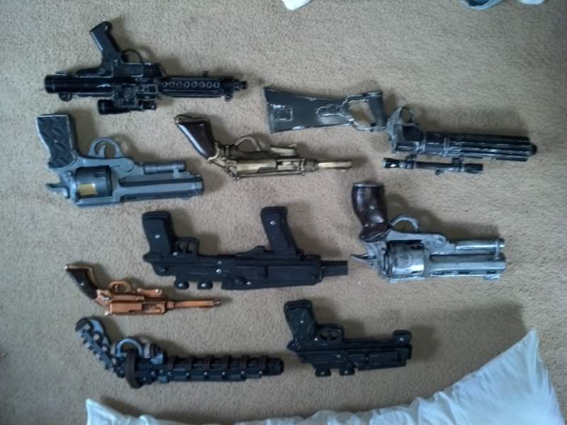 An assortment of guns made, including Samaritan, Stormtrooper and Boba Fett (sorry the image is upside down)