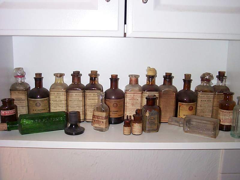 Antique Specific Medicines, many full with boxes.