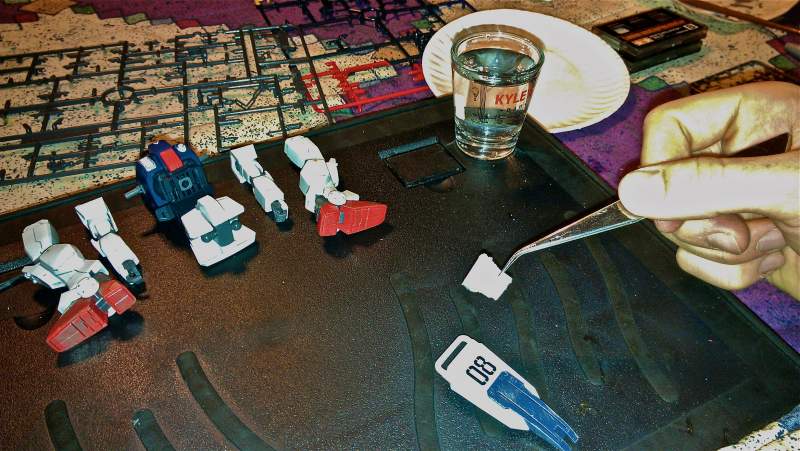 Applying water slide decals.