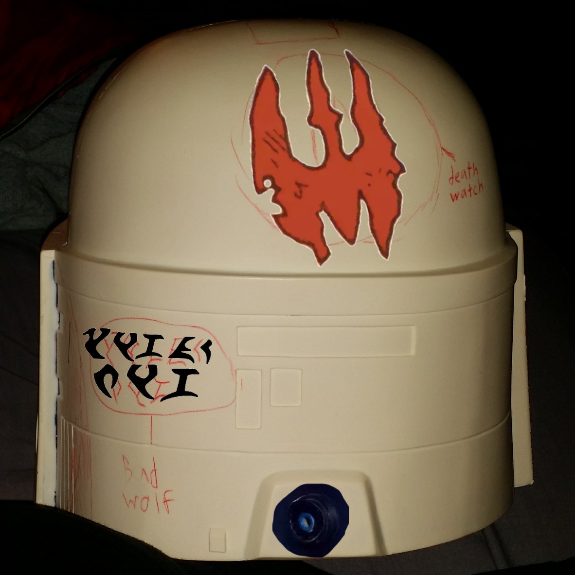 Back of mandalorian helmet. Bad wolf klingon, death watch symbol, probic vent sontaran's