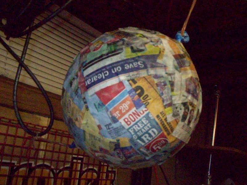 blow up the balloon tie it up. make about 8-10 layers of paper mache depending on desired thickness. takes roughly a day or a night for it to dry
