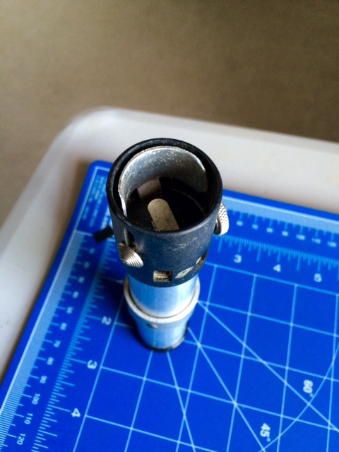 BOLSEY
Flashgun

Interior shot showing the emitter shroud for Yoda's lightsaber. The black cap will need to be removed, inverted, and then placed m