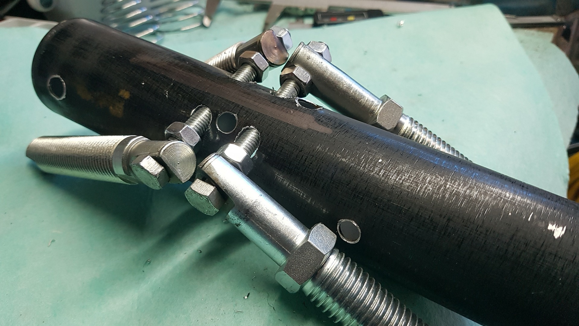 Bolt them together, add a copper thingamajig and a handle to fire the rockets
