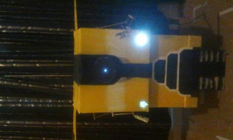 Claptrap made from a few boxes, some spray paint and a few lights, an old aerial, and some old lamp arms :)