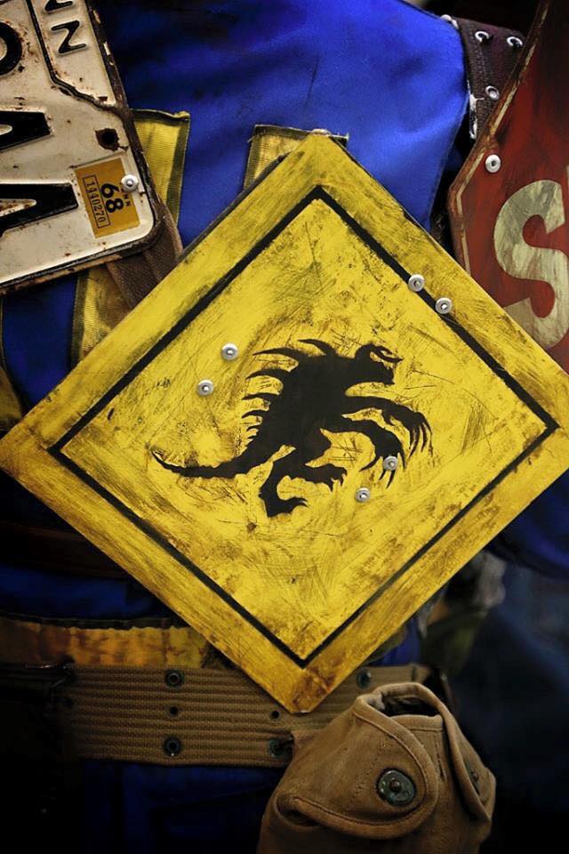 Closeup of the deathclaw crossing sign.