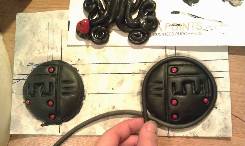 coolant pieces done with apoxiesculpt/so strong pigment. edging and all piping on armor is done with latex tubing.