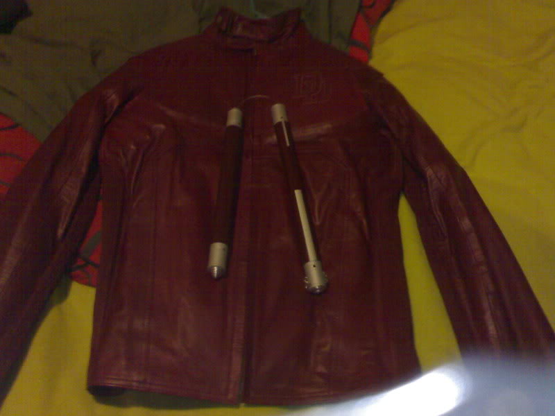 Daredevil Suit and Cane (the type that forms nun-chucks made by a member on RPF I believe, can't remember a long time ago but it was a limited run).