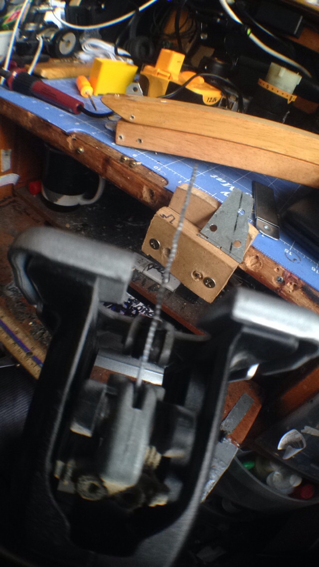 From some 'Simpson tie down' I cut hinges.