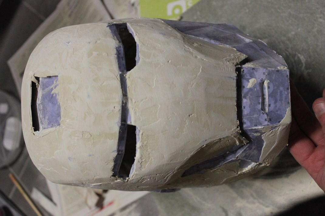 frontview of the Ironman Mark IV helmet with some coats of bondo and sanding