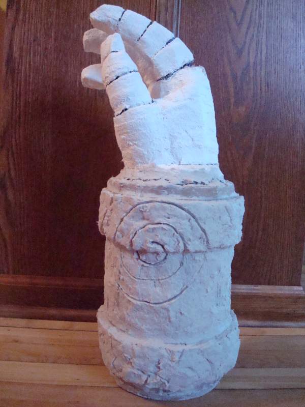 Hand of Doom, started with a hockey glove and large cardboard tube, covered with paper mache.