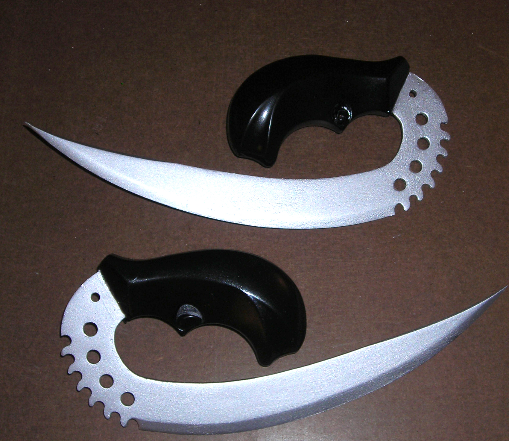 handle added to riddick knives for accuracy, all metal.