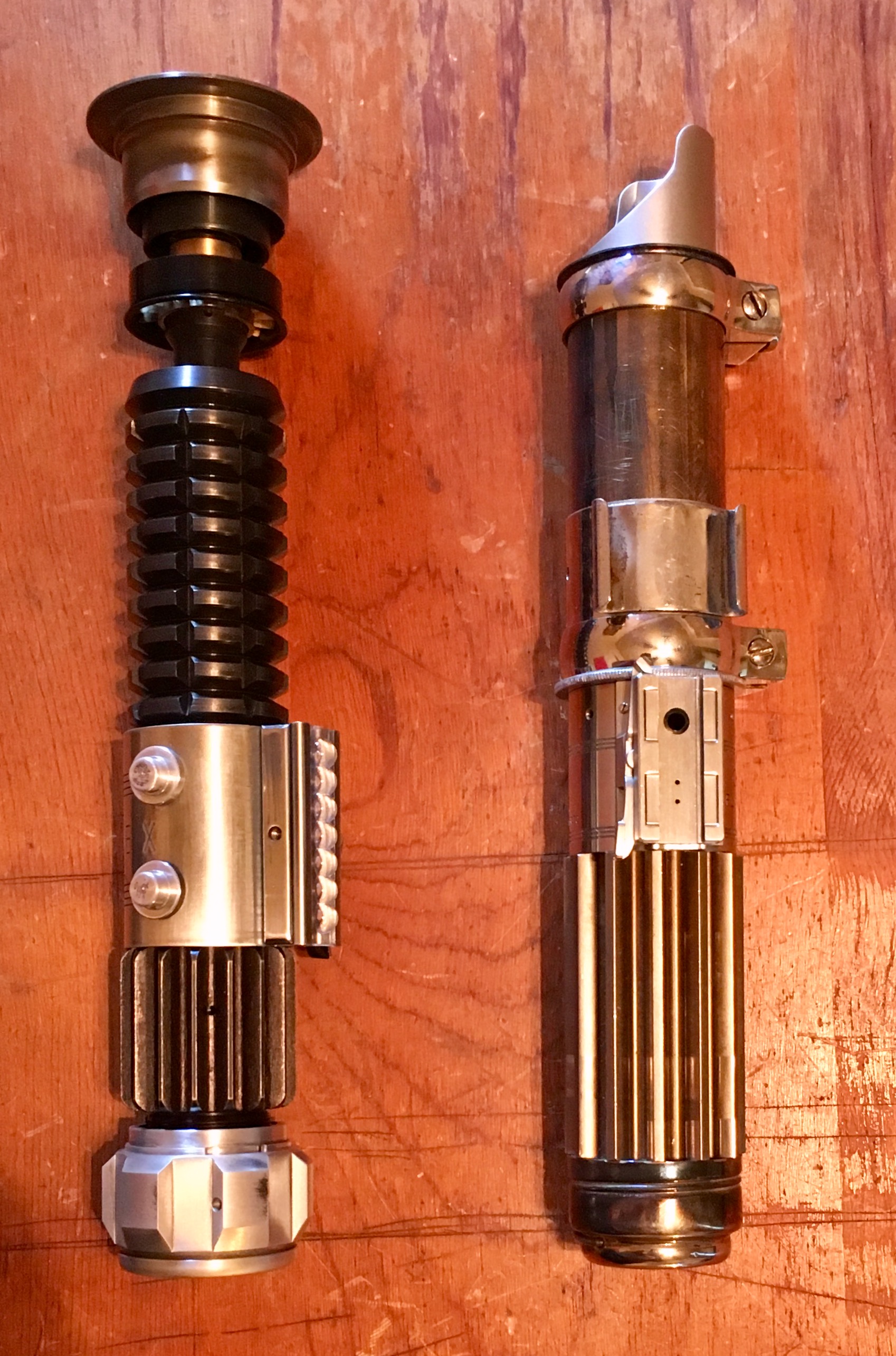 Here is a picture of the saber next to my Roman Props Obi Wan saber.