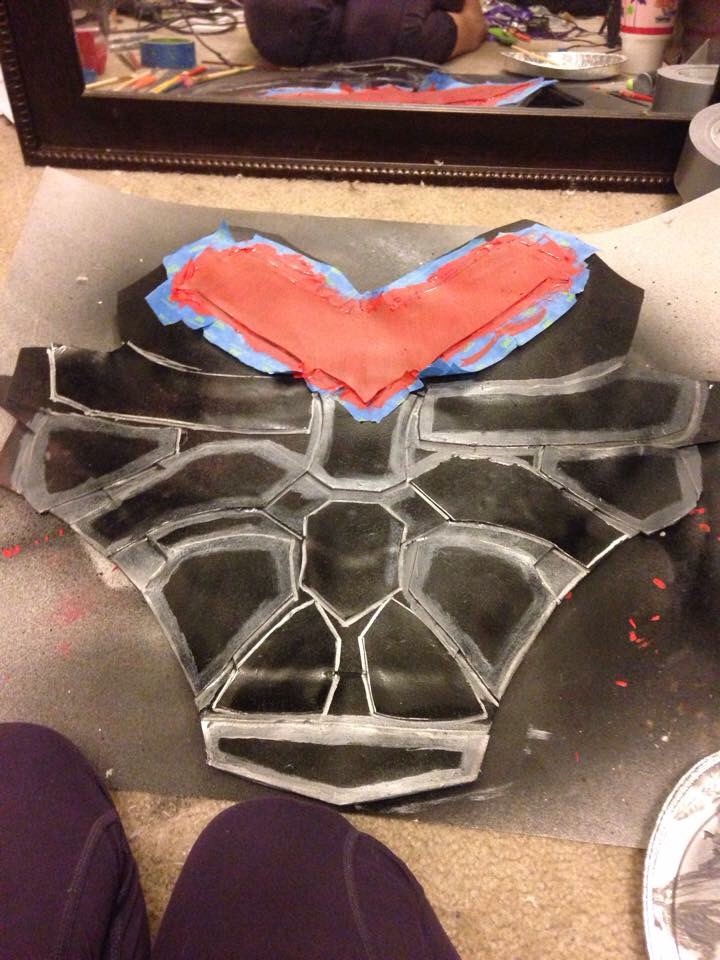 Here is my front armor, sectioned off, as I am detail painting. I used painters tape to section off as I added detailed paint.