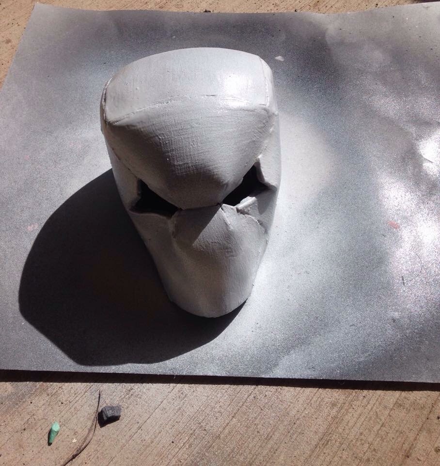 Here is my helmet before spray painting coated with plasti dip.