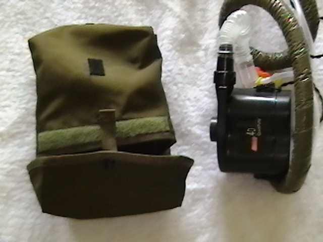 Hose, air pump, and carrier. Pump is necessary for air circulation; a Coleman inflator pump with a remote wire to the switch on the mask. Hose is CPAP