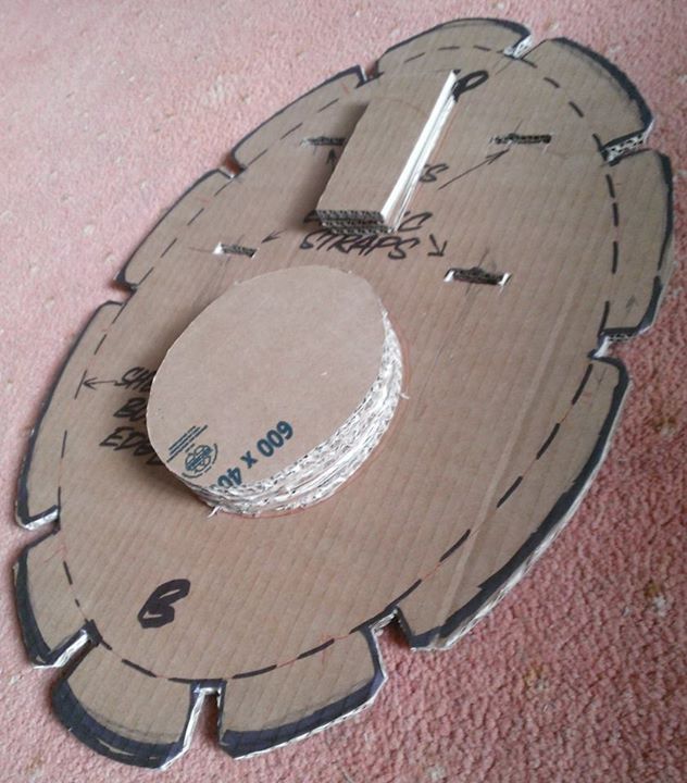 Hot glue shell dome supports and then hot glue the shell body to this.