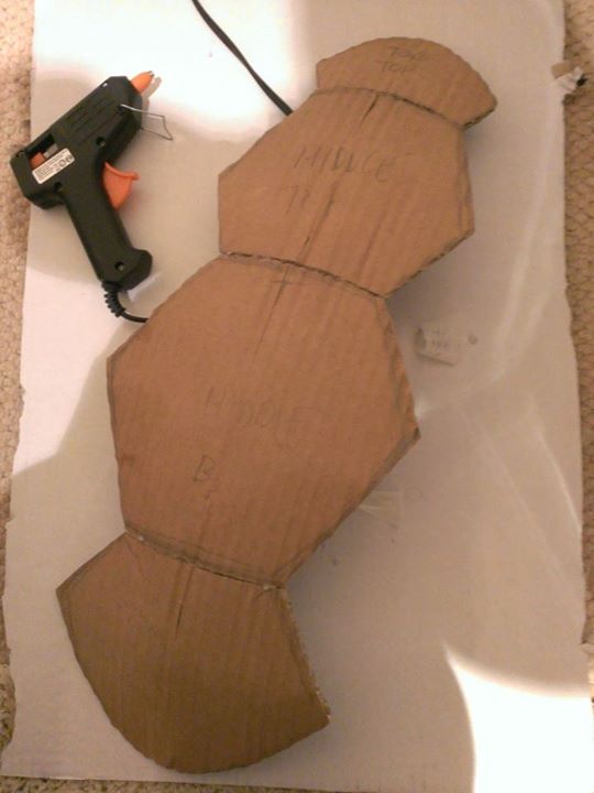 Hot glue the 4 segments together.
