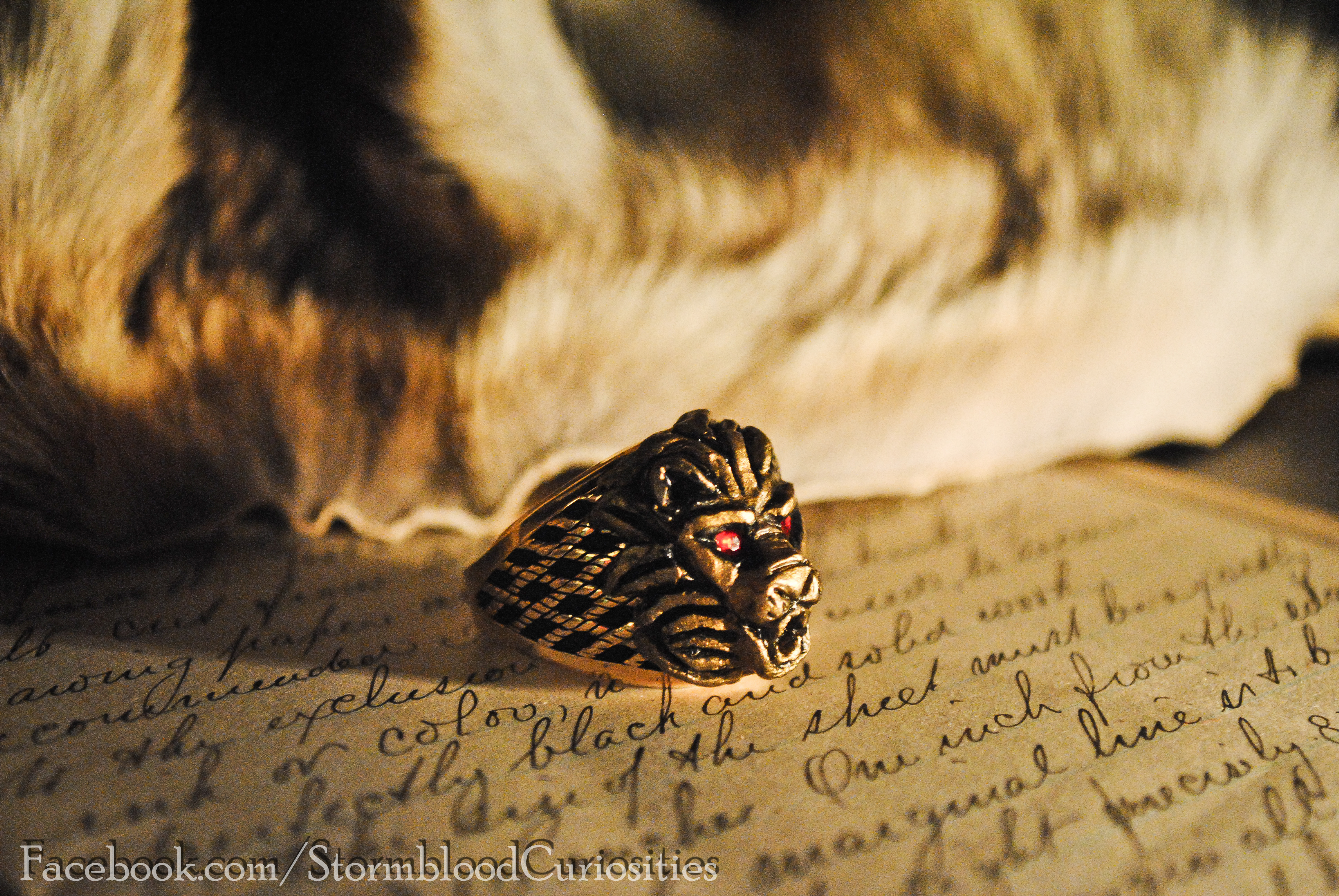 House Lannister, Game of Thrones inspired Sigil Ring with ruby crystal eyes.