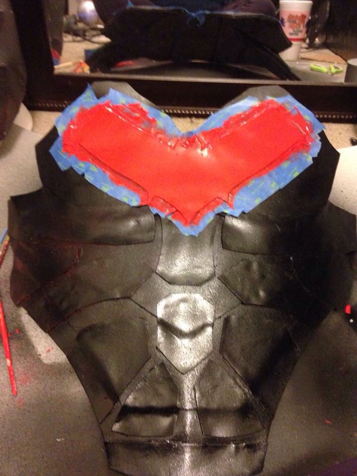 I first spray painted my front armor black, than I used painters tape to section off as I painted more sections