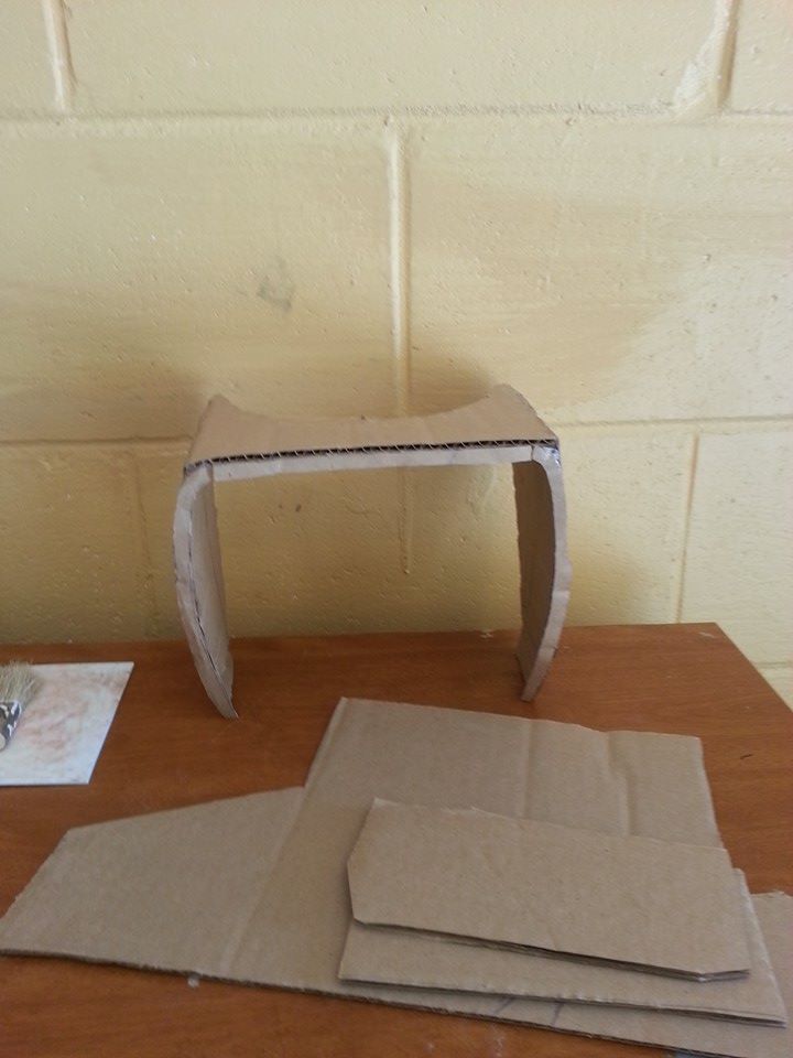 i totolly screwed up on the visor pep when i was applying fiberglass so i had to make it out of cardboard this work a little better in my favor thank