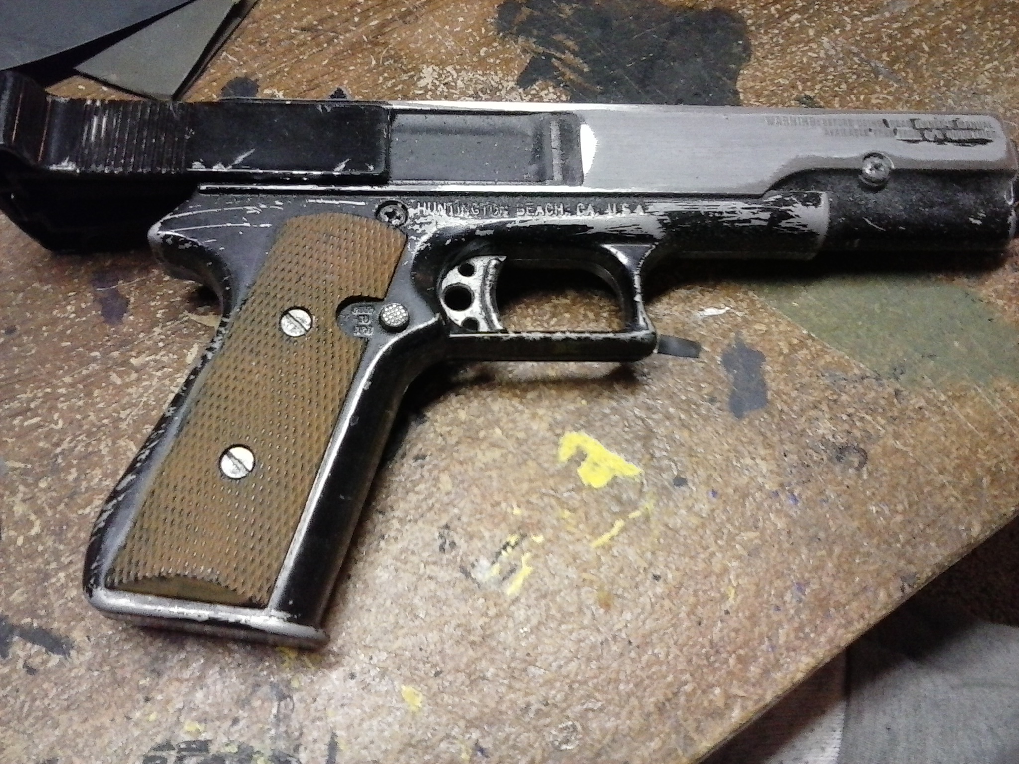 I wasn't happy with the black finish, so I began polishing the BB gun down to it's cast metal finish.