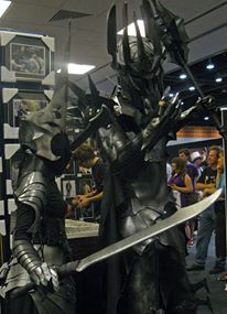 My Sauron is an eight foot tall stilt costume made of plastic, foam rubber, roller blade boots and pvc piping.   I made the Femme-Witch-king for my ni