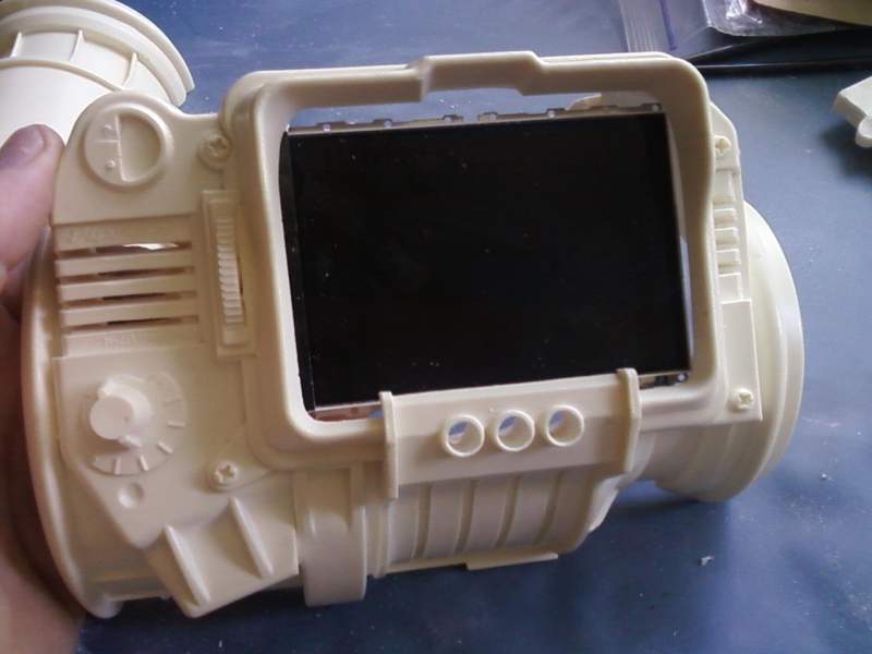 Pip-Boy with iPod Touch LCD. Going to TRY to separate the LCD from the unit and have the screen display the radio screencap.