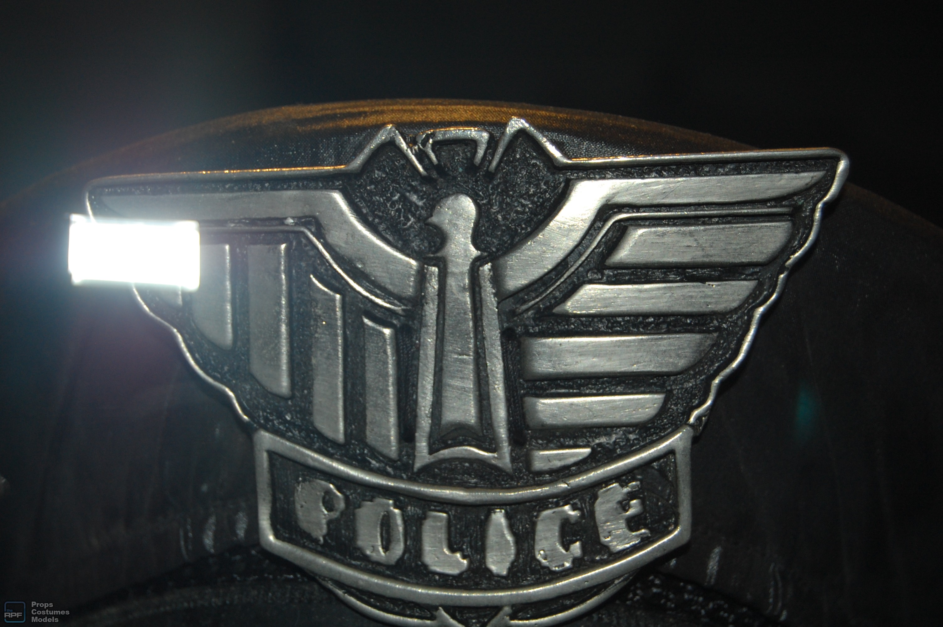 police man cap/helmet and badge
