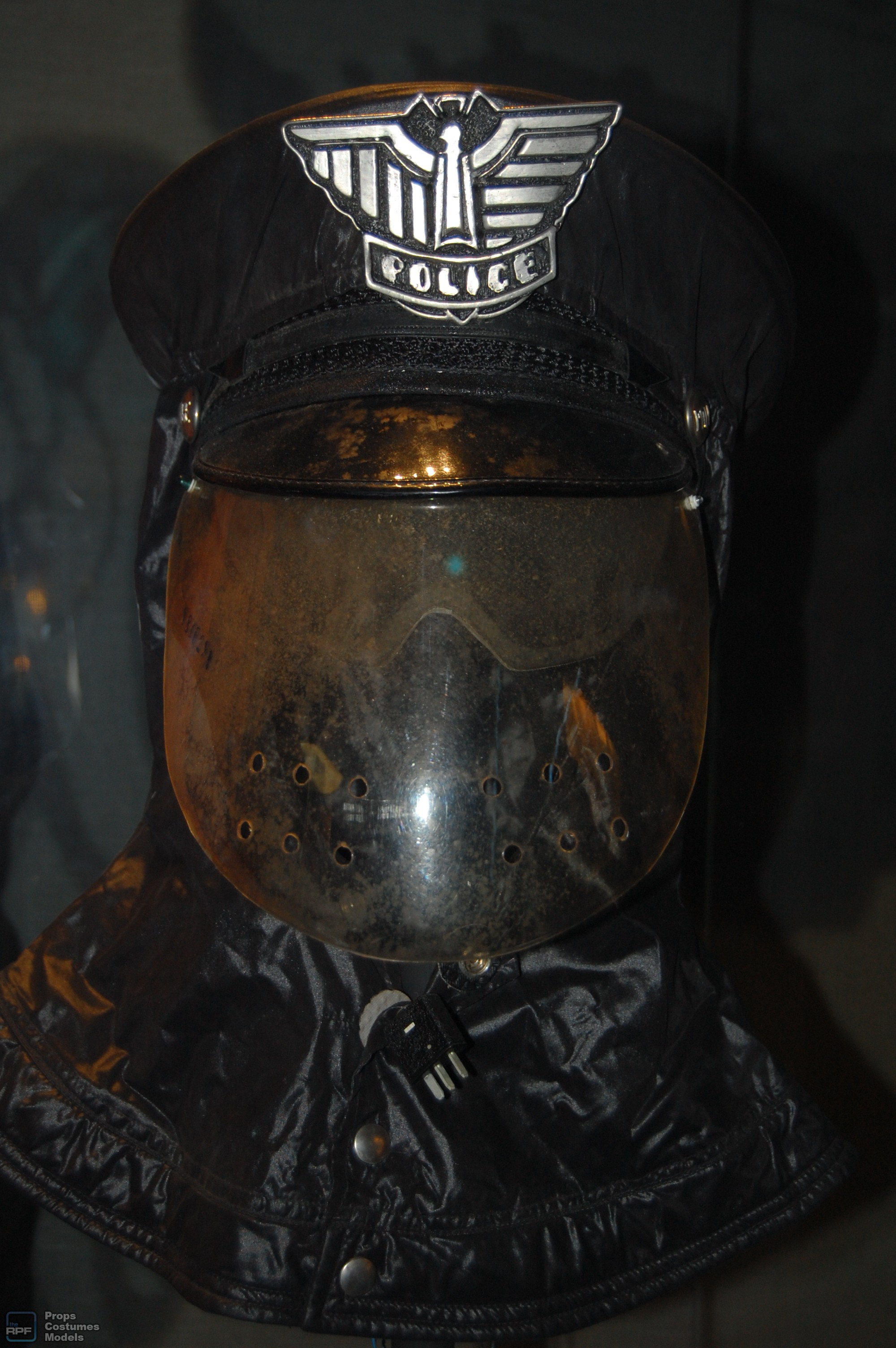 police man cap/helmet and badge