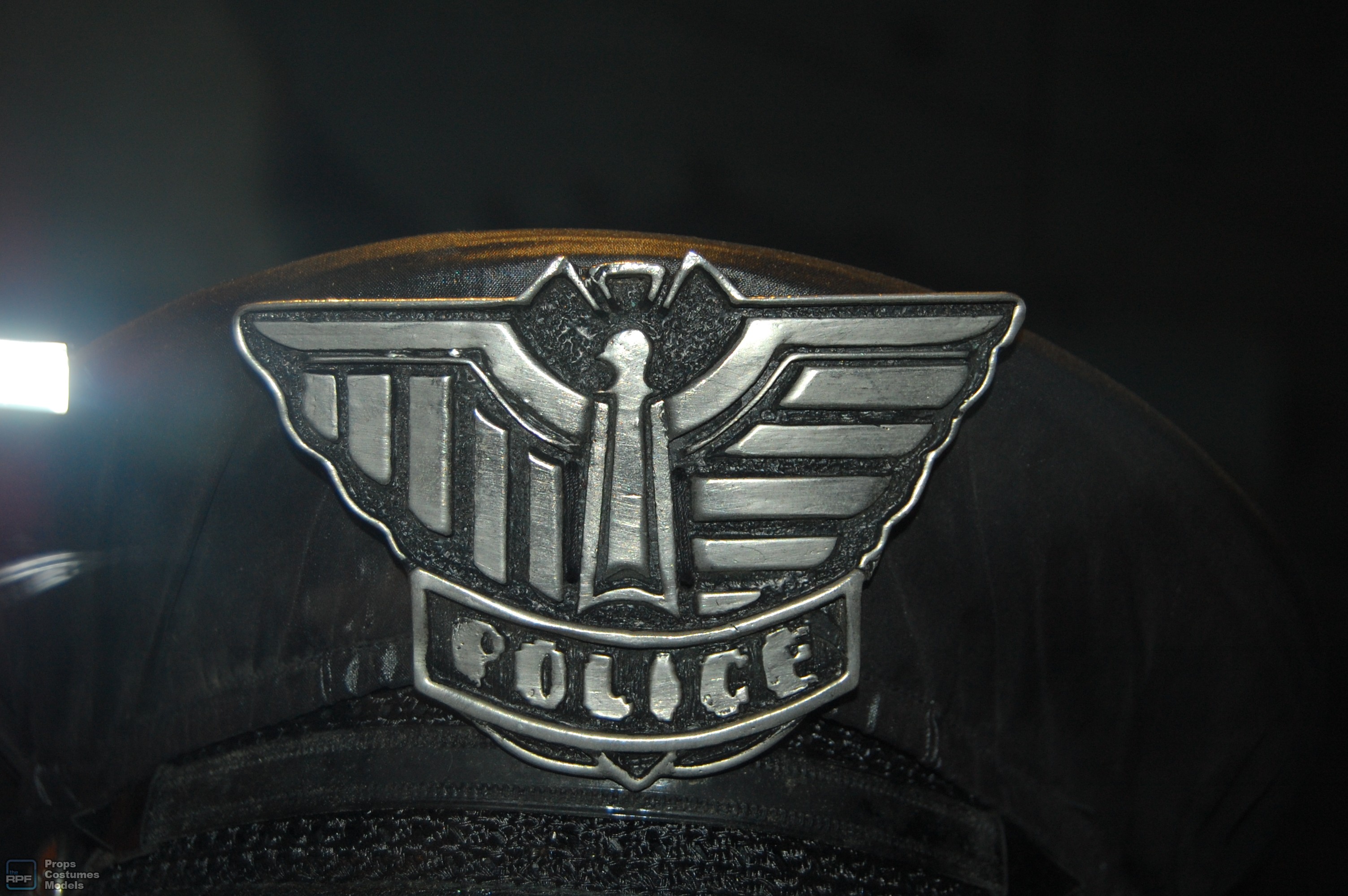 police man cap/helmet and badge