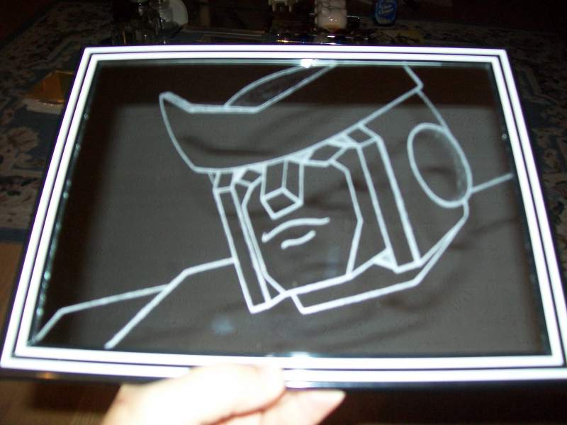 Ratchet, G1. This one is my original drawing as well, and done for a BIG Ratchet fan that is also the lady who got me into TF costuming, as a gift. No