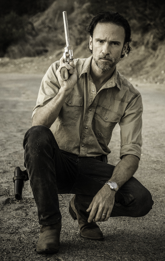 Rick Grimes cosplay with Justin boots, Python 357, Swivel Holster, Khaki Shirt, Black Jeans. wedding band and watch.