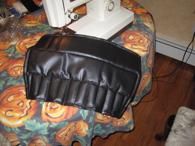 Sewing the design.