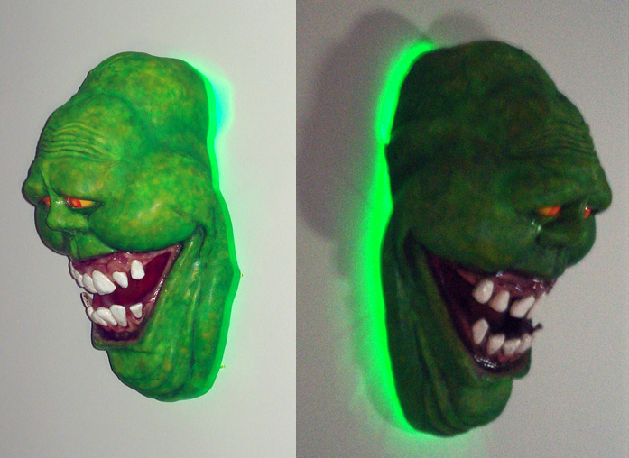 Slimer is backlit by a series of 4 hyperbright green LEDs giving him that 'phasing through wall' look.