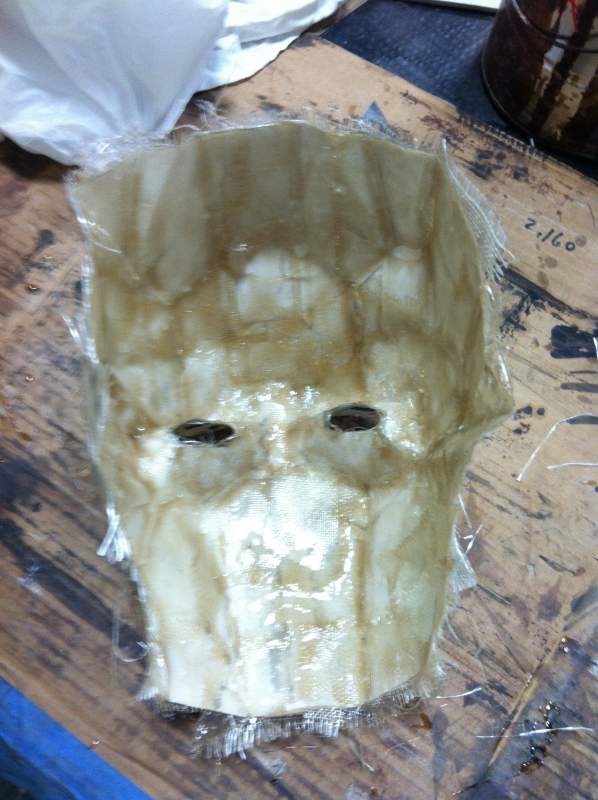 sprayed adhesive to the inside then set in fiberglass with resin on top