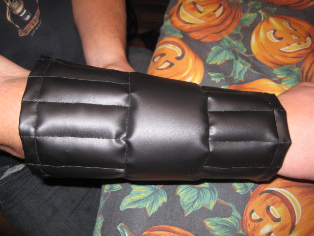 Still needs one more part. wrap the middle with basically another layer of the fake leather stuff.