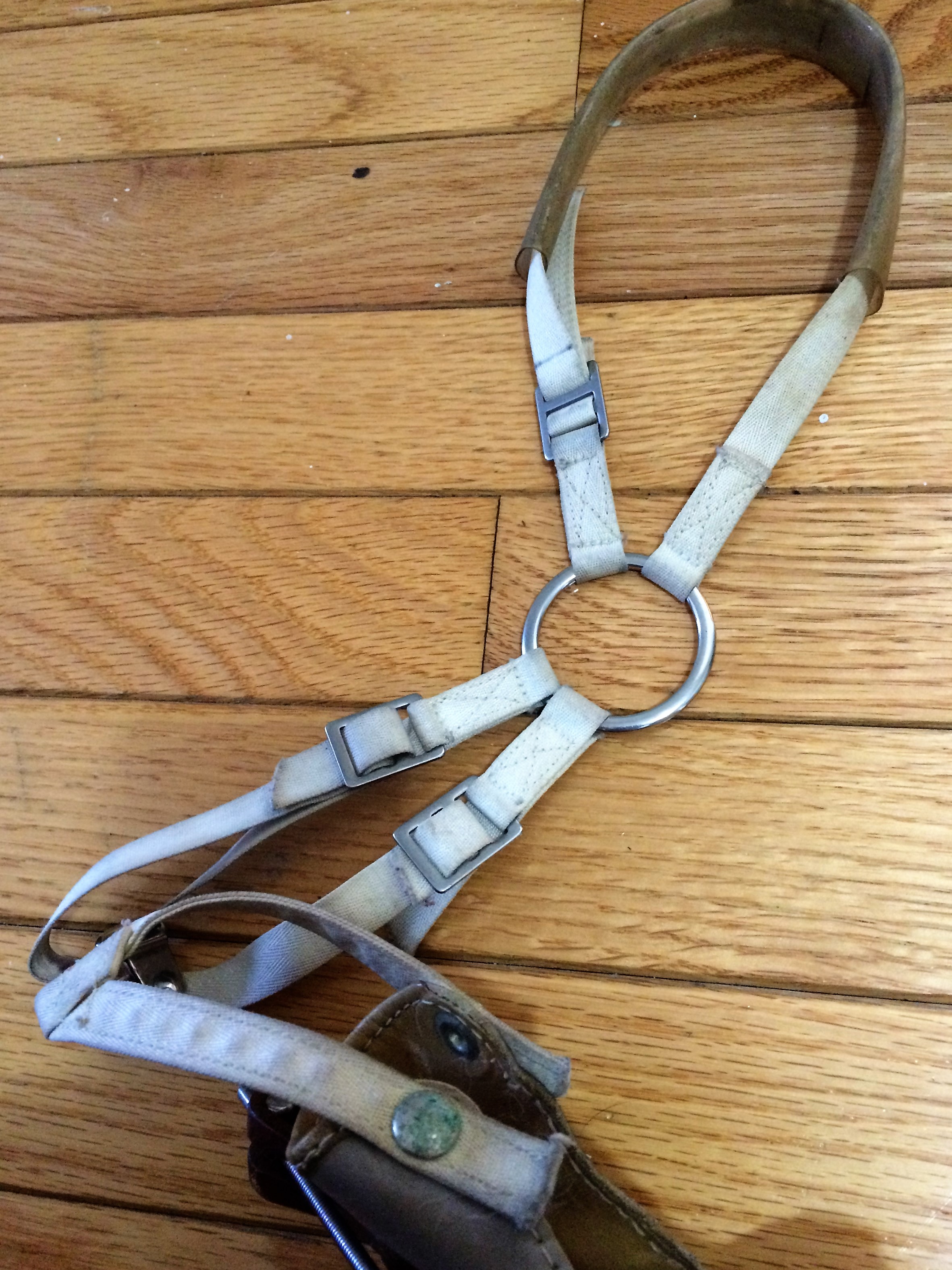 The child would operate it by moving the opposite shoulder.  By doing this it pulls a wire that runs through a spring system moving the claw.  The elb