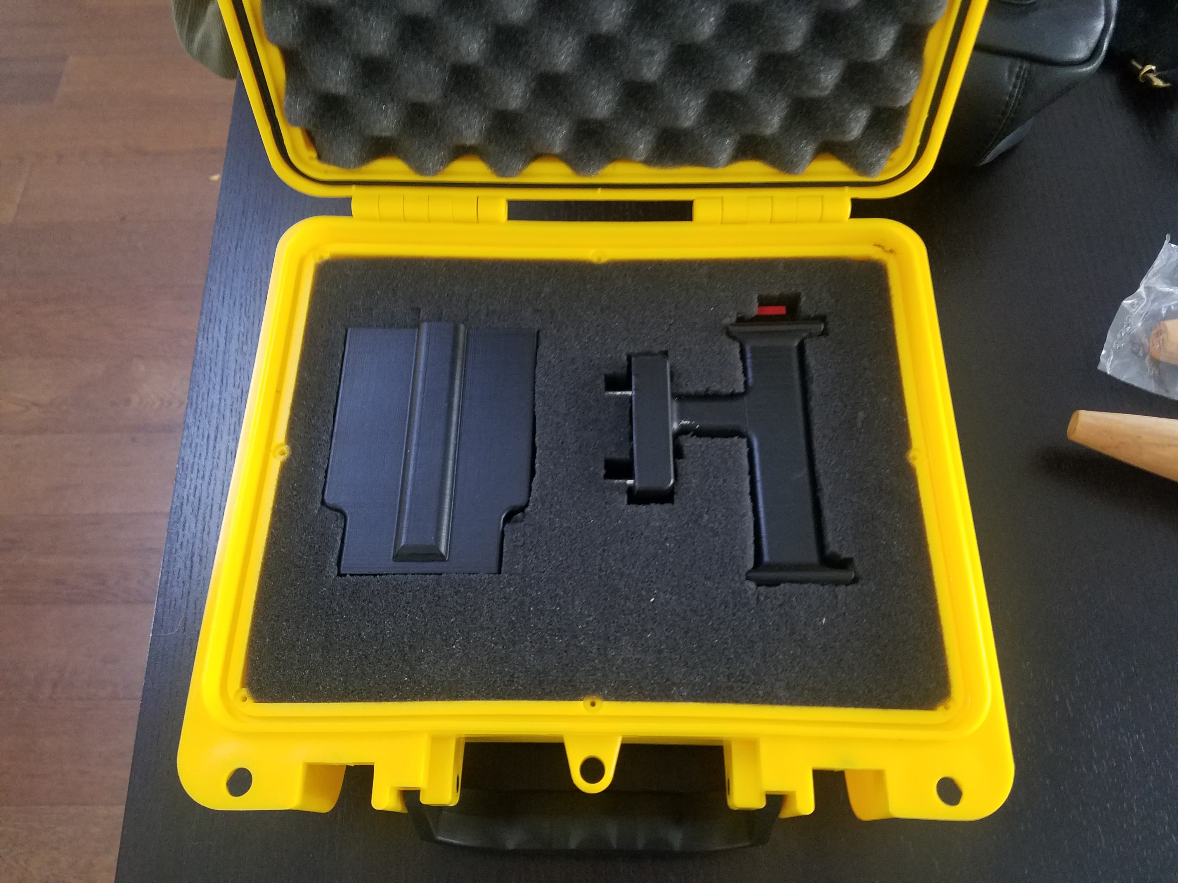 The Grapple Gun Case with the Parts Inside