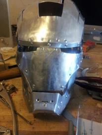 The helmet still needs alot of work, the face plate is just sitting on the helmet