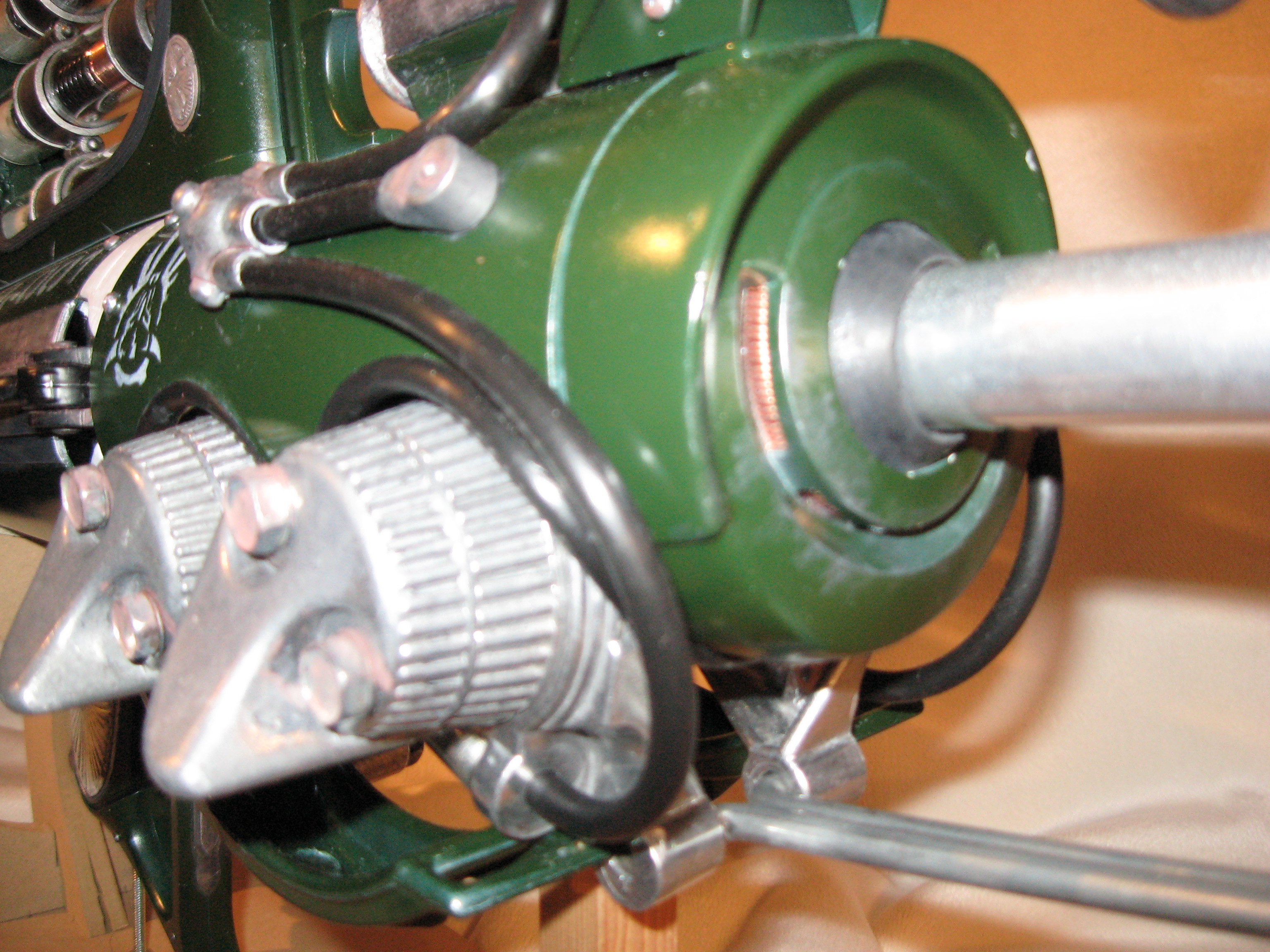 The main cowling (and rear) is from a 60s blender. I built the extended body from two toilet paper holders.
