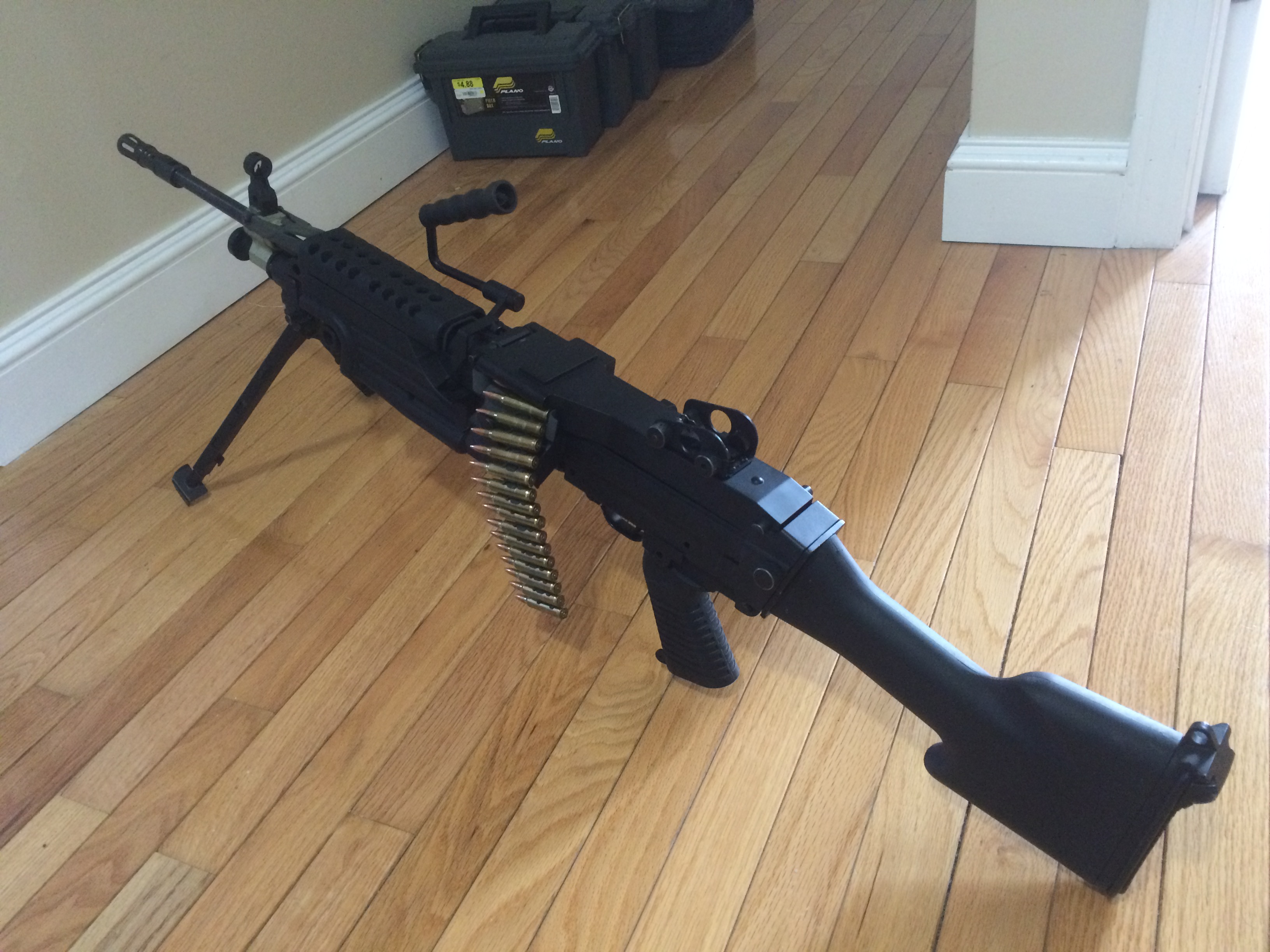 This is actually a 10/22.  I put it inside of a M249 SAW body and attached a fake belt to make it look awesome (it turns heads at any range you go to!